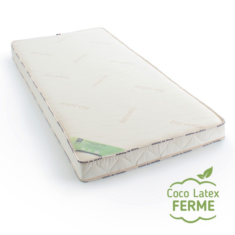 Les plus de notre matelas d'enfant en coco et latex 90x190 Composition du matelas bi confort  Habillage en maille souple en Coton Bio Gots Nappage coton bio 300g/m² Âme fibres de coco 8 cm, densité 70 kg/m3 - Ferme Ame latex 100% naturel 4 cm, densité 65kg/m3 - Equilibré        Coutil en maille COTON BIO, certifié GOTS  Son coutil en mailles coton bio souple apporte à la fois le confort et la sécurité du naturel, et le moelleux du stretch (légèrement extensible). Très respirant, ce coton bio évacue l'humidité, pour un confort parfait et des nuits de sommeil douces et profondes. Certification GOTS - Global Organic Textile Standards : Standard international garantissant que les producteurs ont pris l'entière responsabilité environnementale et sociale dans le processus de production. Le textile est garanti fabriqué à partir de fibres biologiques. Lutte contre les bactéries nocives pour la santé.      Garnissage bio coton, certifié GOTS  L'habillage de notre matelas est doublé d'une nappe épaisse de coton bio organique, 300g/m², le volume de coton bio apporte à l'enfant une fraicheur végétale pour l'été, et un confort douillet. Le garnissage doux et gonflant du coton bio respire au rythme des mouvements de l'enfant. Anti transpiration, il évacue la moiteur et offre à votre enfant un environnement sain (absorbant à 30 % de son poids en eau), pour le bien-être de enfant dans son sommeil. Il évite aussi le désagrément des odeurs froides et persistantes. Récolté respect de l'environnement garanti les bons usages dans le processus de production. Le textile est garanti fabriqué à partir de fibres biologiques. Lutte contre les bactéries nocives pour la santé.     Coeur du matelas en fibres de coco  L'âme de notre matelas enfant en fibres de coco, une matière 100% naturel en production écologique, la fibres de coco est tenue en suspension, soudée au latex naturel à son état liquide. (découvrir) La fibre de coco absorbe naturellement l'humidité et la moiteur de la transpiration. Une matière 100% naturelle, son âme donne un soutien ferme, idéal pour le corps d'enfant. Les fibres naturelles de coco sont soudées au latex naturel, l'ame de coco hérite des qualités mécaniques et des bien-faits du latex, son pouvoir répulsif, (voir ci-dessous).       Coeur du matelas latex 100% Naturel  Parce que le latex à une excellente élasticité naturel, procure un bon retour en énergie, la matière ne reçoit la pression qu'à l'endroit où la charge est exercée. Il permet une répartition optimale de la pression du corps de votre enfant. Le latex ci-contre est la défense naturelle de l'hévéa dans son milieu tropical. Sans aucune transformation, le latex garde toutes ses qualités protectrices pour que l'enfant dorme en toute sécurité.       Informations Pratiques Ce matelas enfant est de fabrication 100% française : Conçu et réalisé par Matelas No Stress ®. Son emballage : Ce matelas enfant fibres de coco, est emballé par nos soins, et livré dans une housse en polyuréthane à base de plastique recyclé très résistante. Pour une meilleure protection, notre matelas en coco est expédié non roulé dans un carton, lui aussi fabriqué à base d'anciens cartons recyclés, un plus pour l'environnement. Livraison GRATUITE. Voir les conditions de fabrication et livraison.