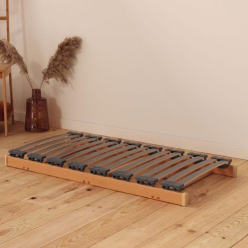 Quels sont les avantages d'un sommier sur mesure par rapport à un sommier standard ?